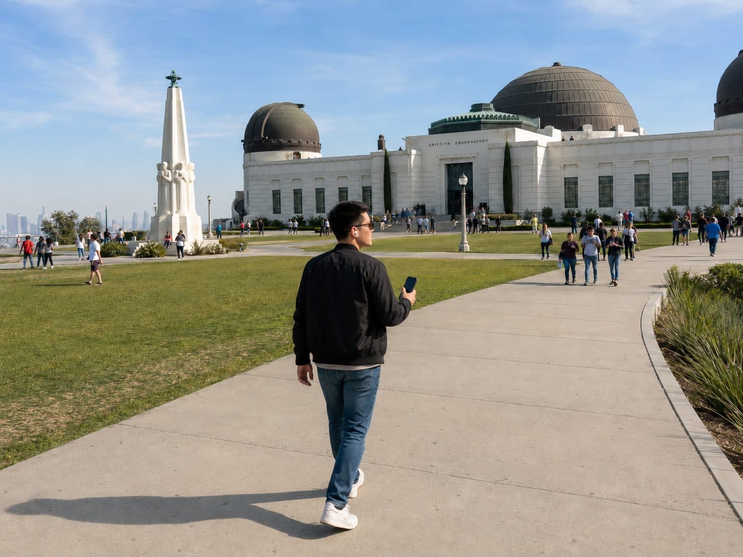 A visitor walking toward Griffith Observatory while following a self-guided route.